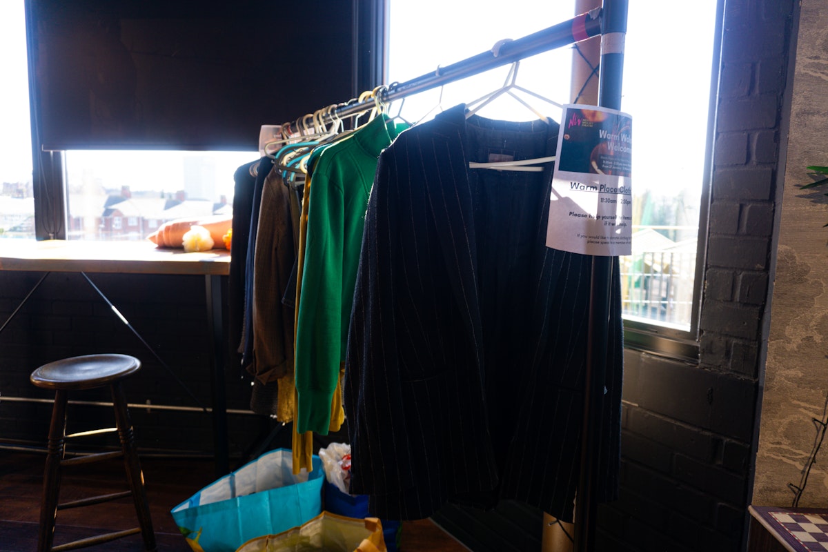 A range of warm clothes hung up for donations